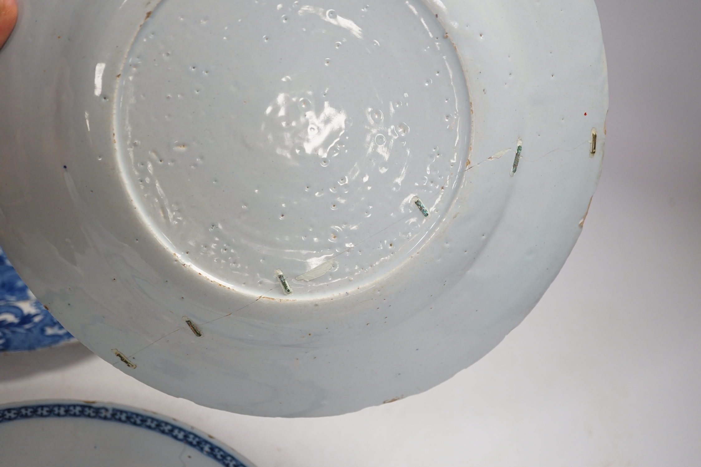 Two 18th century Delft plates and a 19th century Masons ‘Crown Inn’ plate-24cm diameter